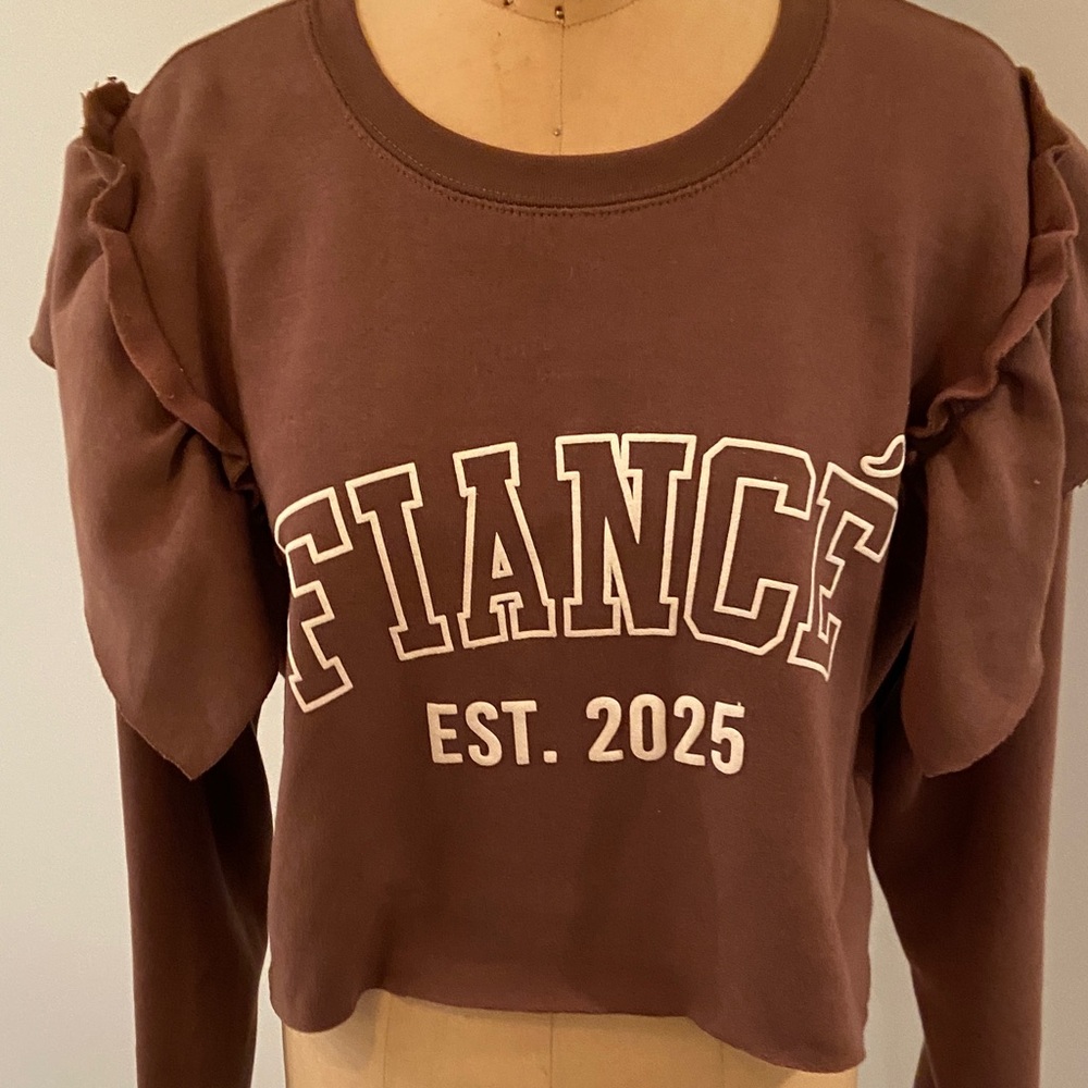 Calling all brides-to-be. Restyled sweatshirt made out of a new garment.